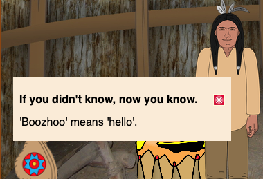 Pop-up box in wigwam saying "Boozhoo means hello"